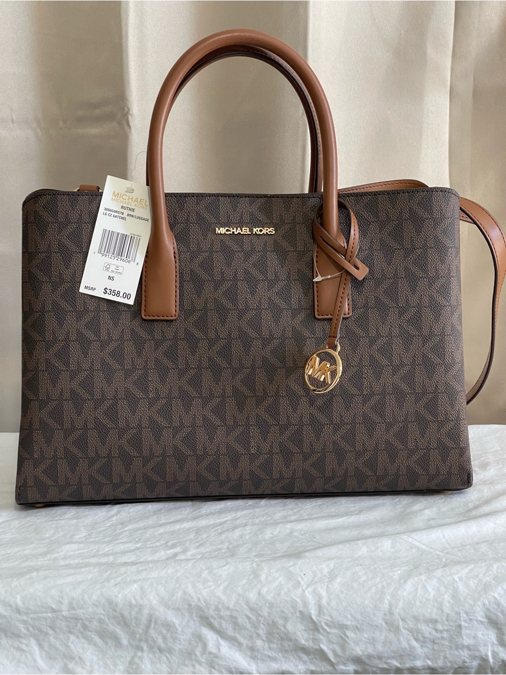 Michael Kors Large Ruthie Satchel. Monogram Safiano Leather Never worn. NWT $179